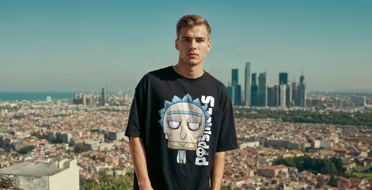 a man with oversize black t-shirt with a unique popsikulls graphic design with a city in the background